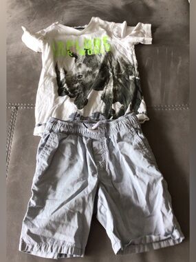 White Graphic Rhino Tee and Light Gray Shorts